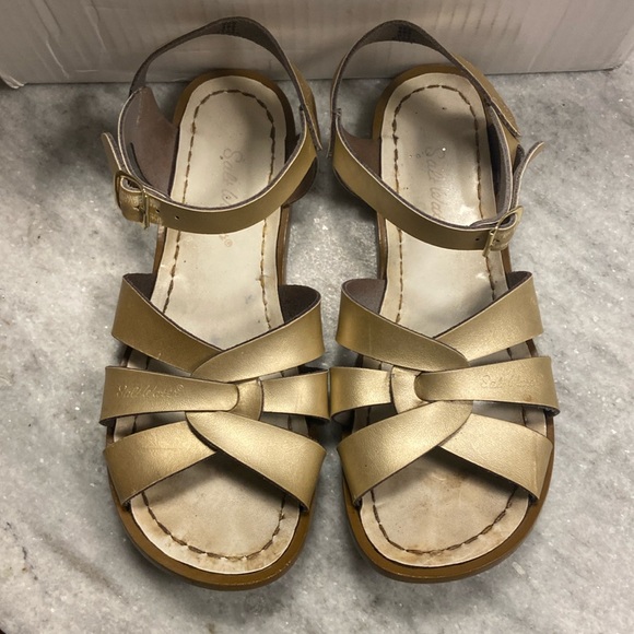 Used gold salt water sandles a little worn out but still cute and colorful. - Picture 1 of 8